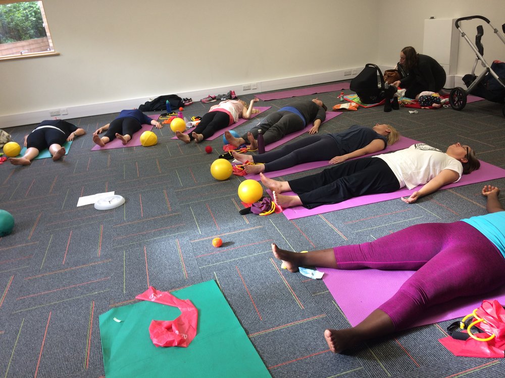 Relaxing at the end of an exercise session.